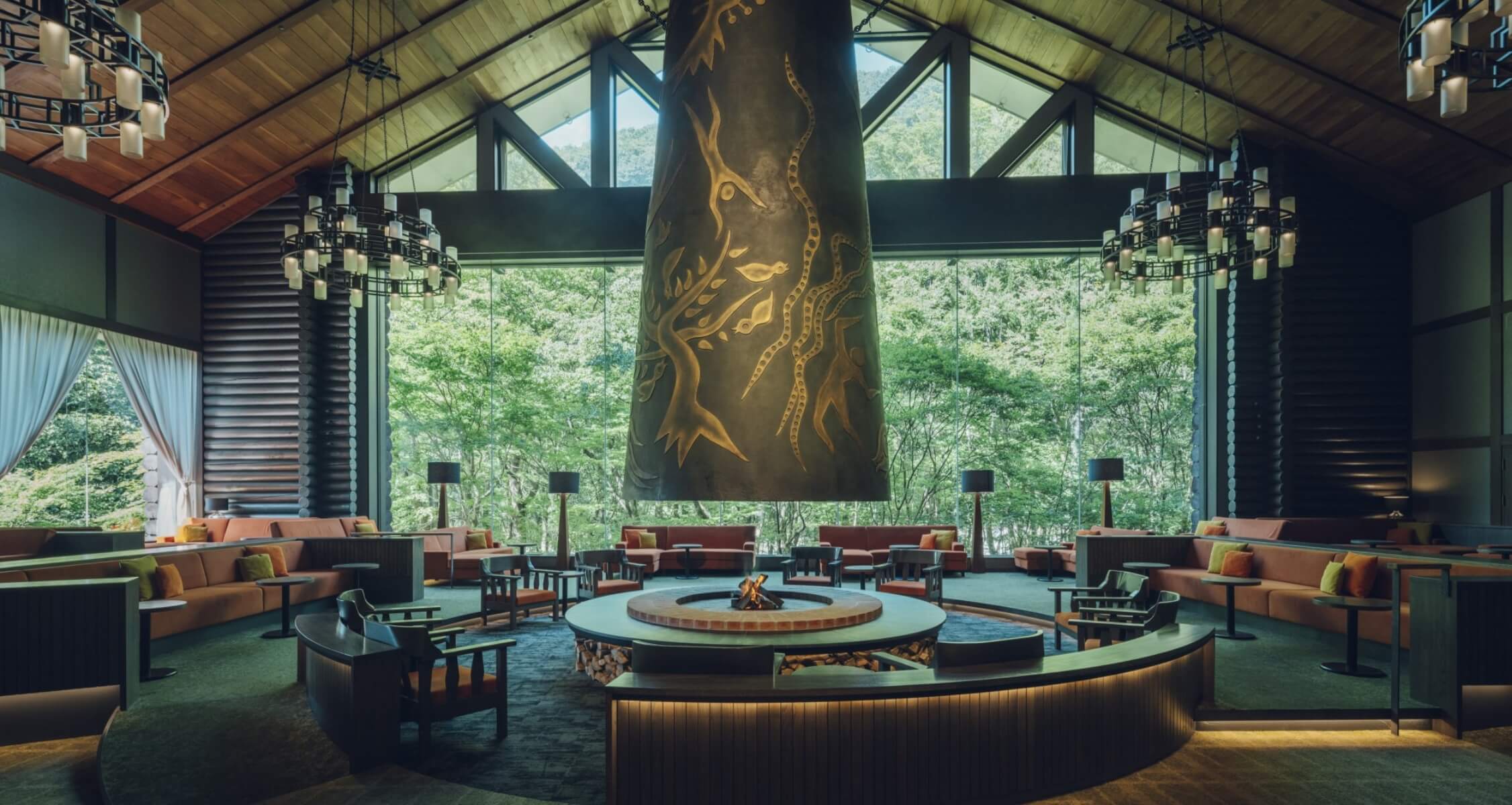 Lobby at Oirase Keiryu Hotel with Taro Okamoto's 'Forest Myth' and the greenery of Oirase Stream