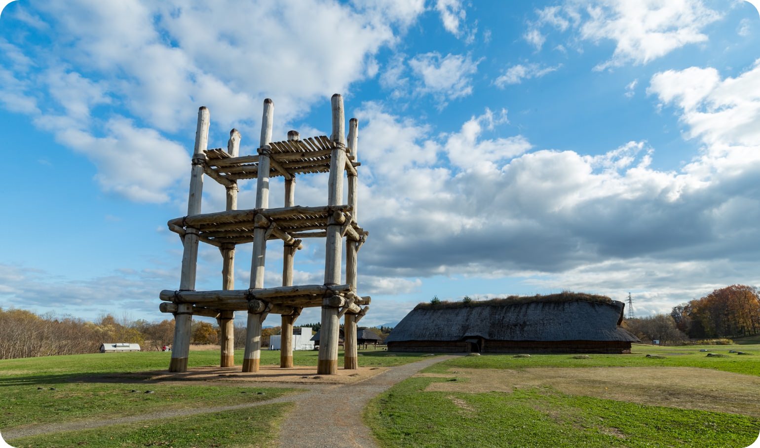 A massive six-pillared structure reaching straight up to the sky