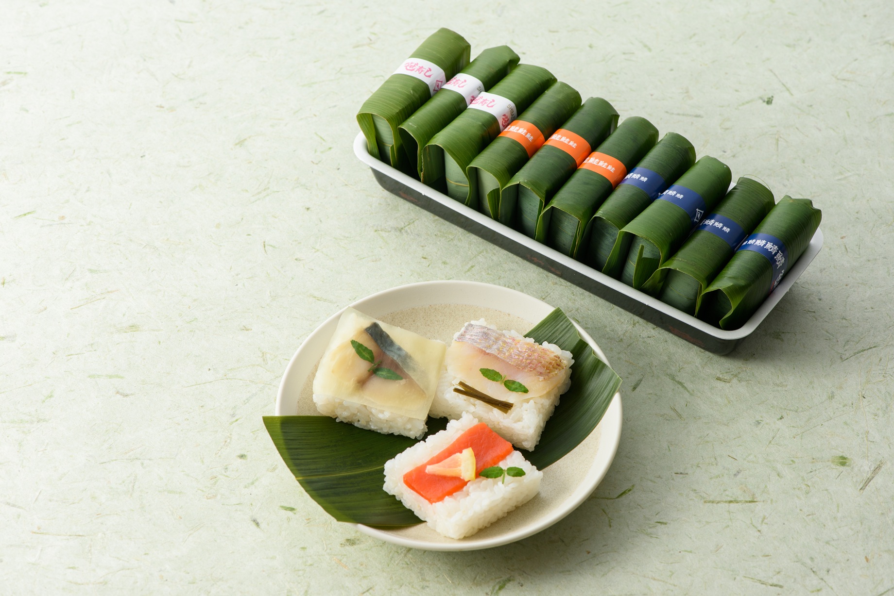 Clockwise from front right: salmon, mackerel, and sea bream.