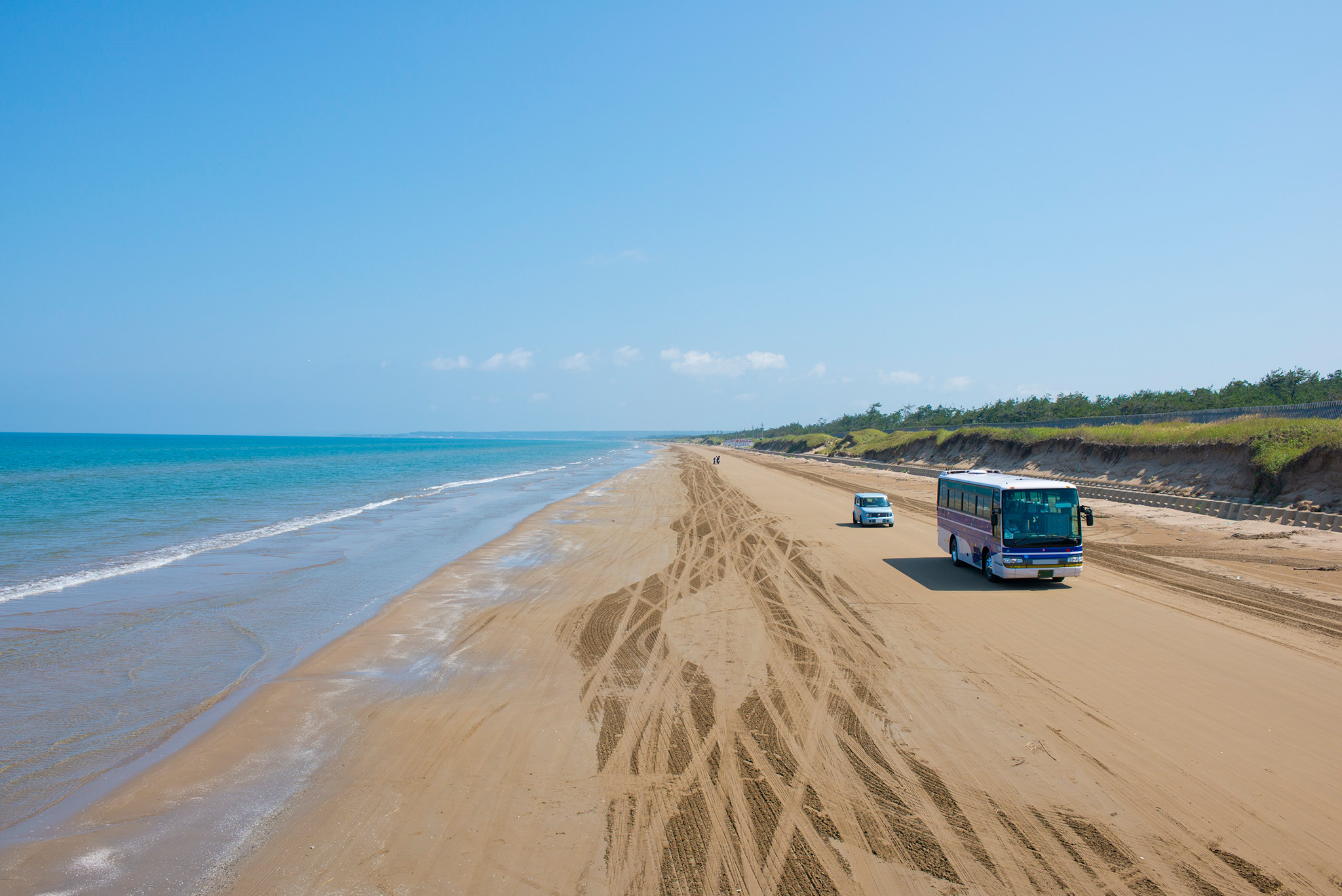  Tourist buses, motorcycles, and bicycles sometimes drive by.