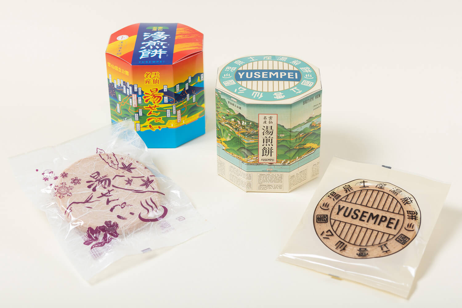 從左到右，是常常特價的「雲仙湯煎餅」和一顆一顆手工烘焙的「純一拼手工烤 雲仙煎餅」。 包裝設計也很吸引人