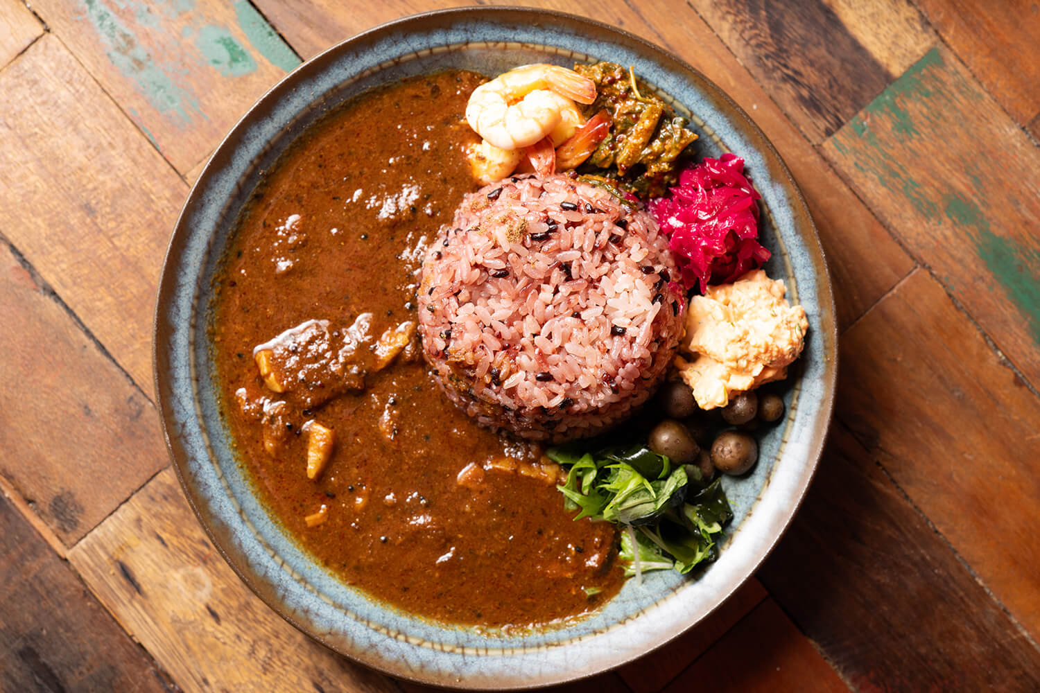 「梅子豬肉賓達魯」上面有六種主廚推薦，價格是500 JPY1050。 可以單點幾種配料。