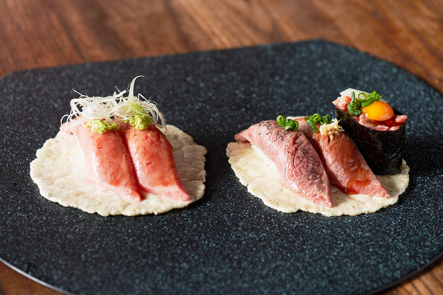  From left: “Hida Beef Toro Sashi Nigiri” (2 pieces) and the “Value Three-Piece Assortment” featuring Hida Beef Nigiri and Hida Beef Gunkan (3 pieces), each 1,200 yen