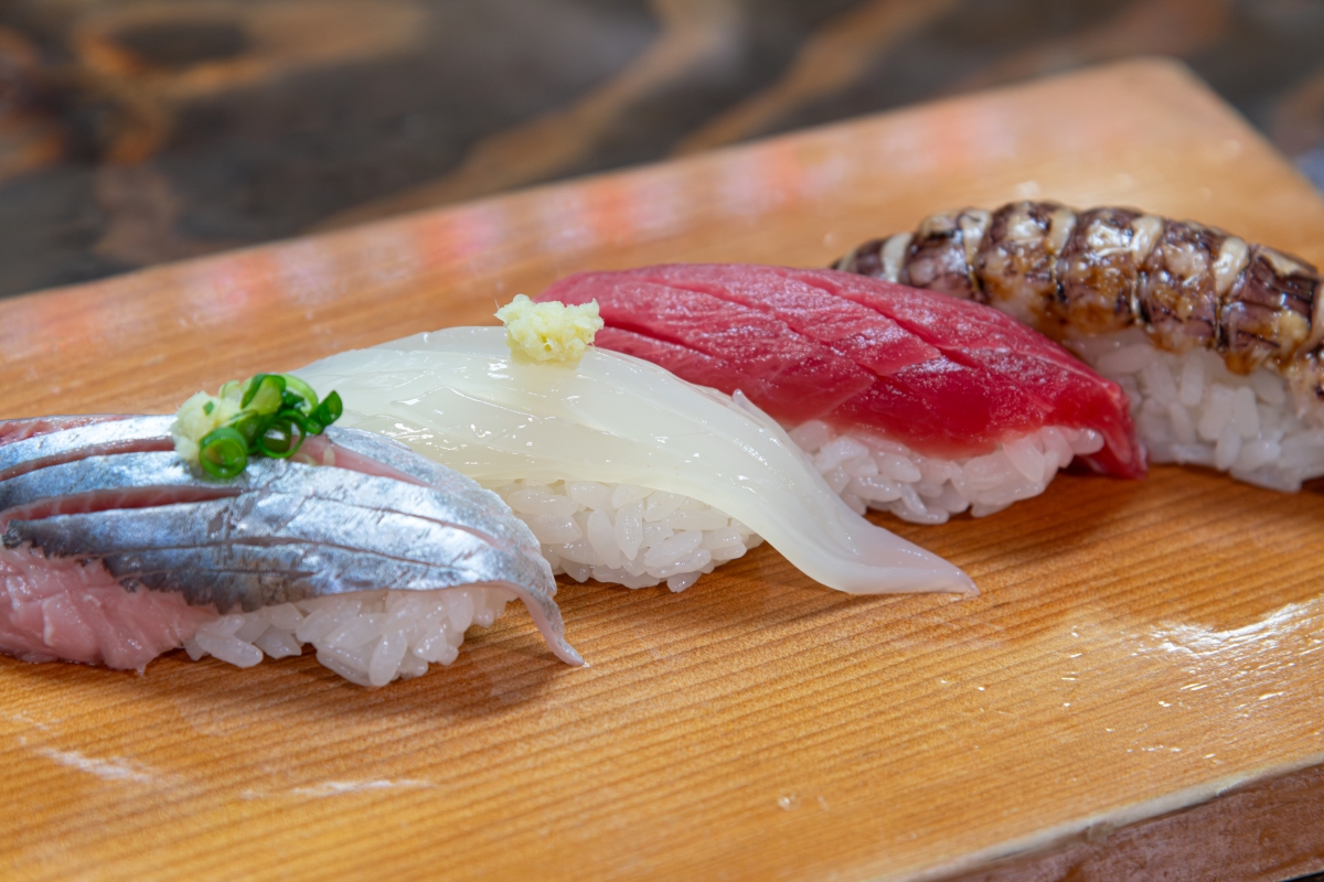 We pride ourselves on fresh ingredients sourced within the market. From left: herring, squid, medium-fatty tuna, and mantis shrimp.