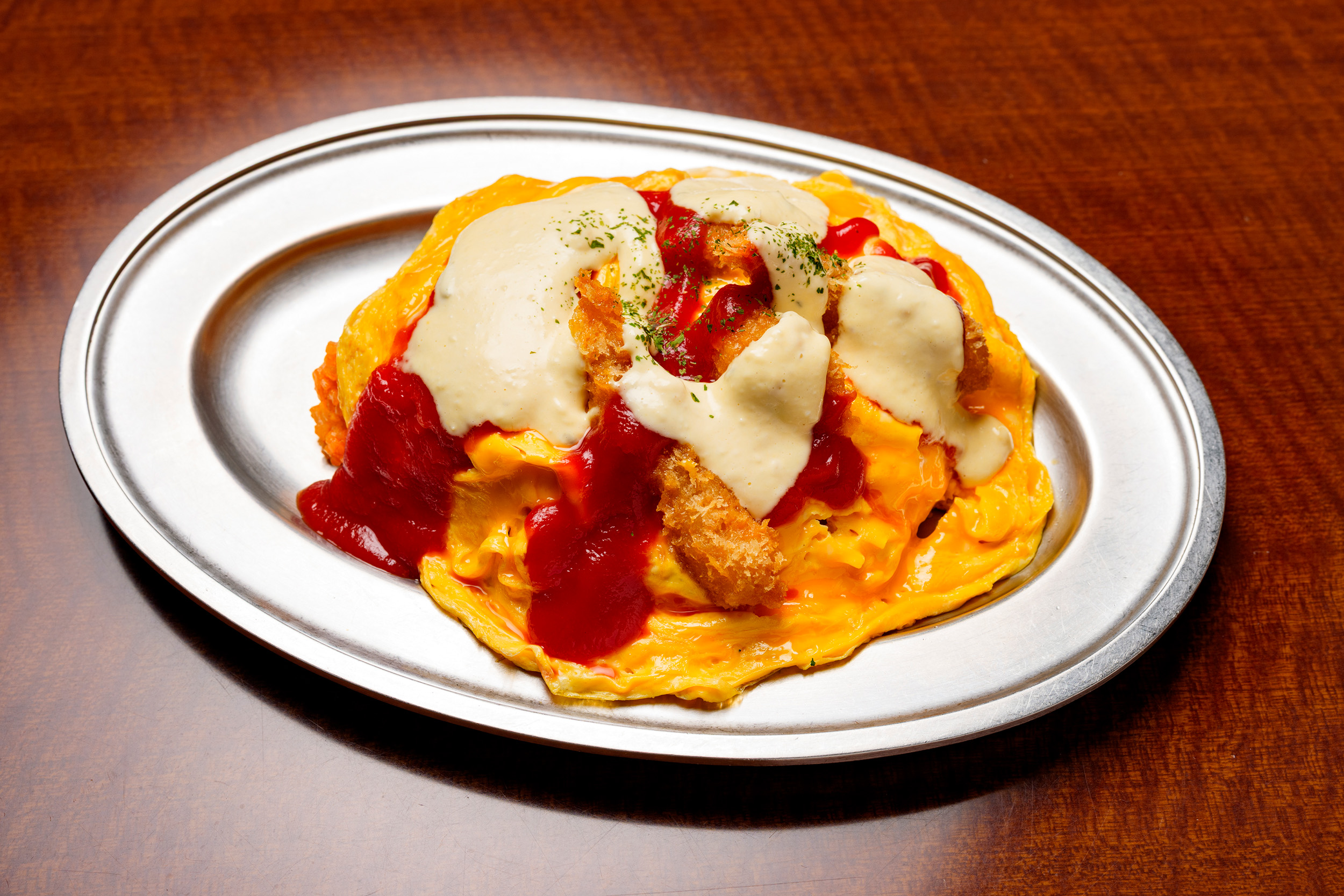 「ハントンライス」1,350円。ライスの量が少なめの小（1,250円）、大盛りの大（1,600円）もある